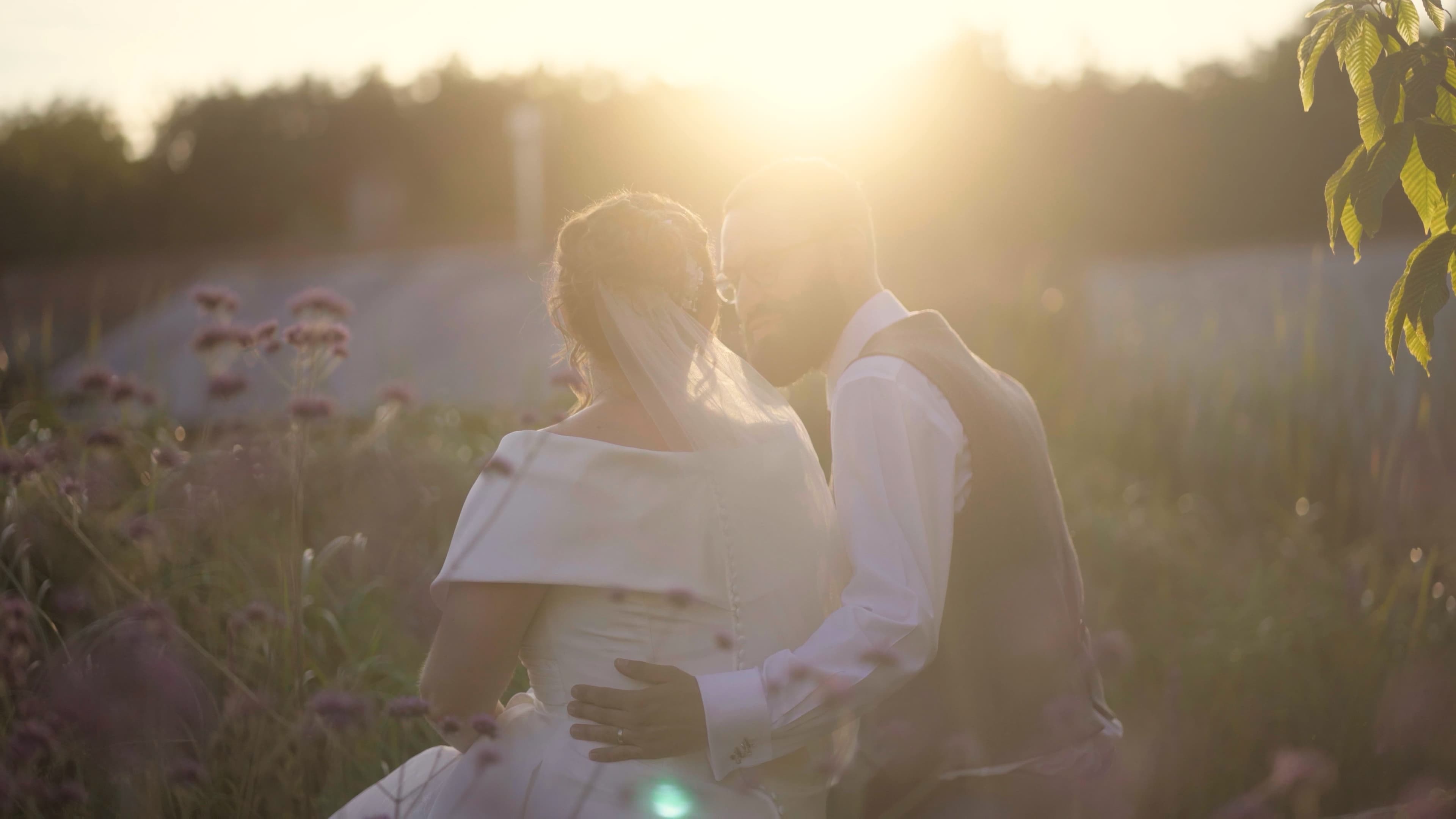Close-up of Lewis and Sarah sharing a quiet laugh