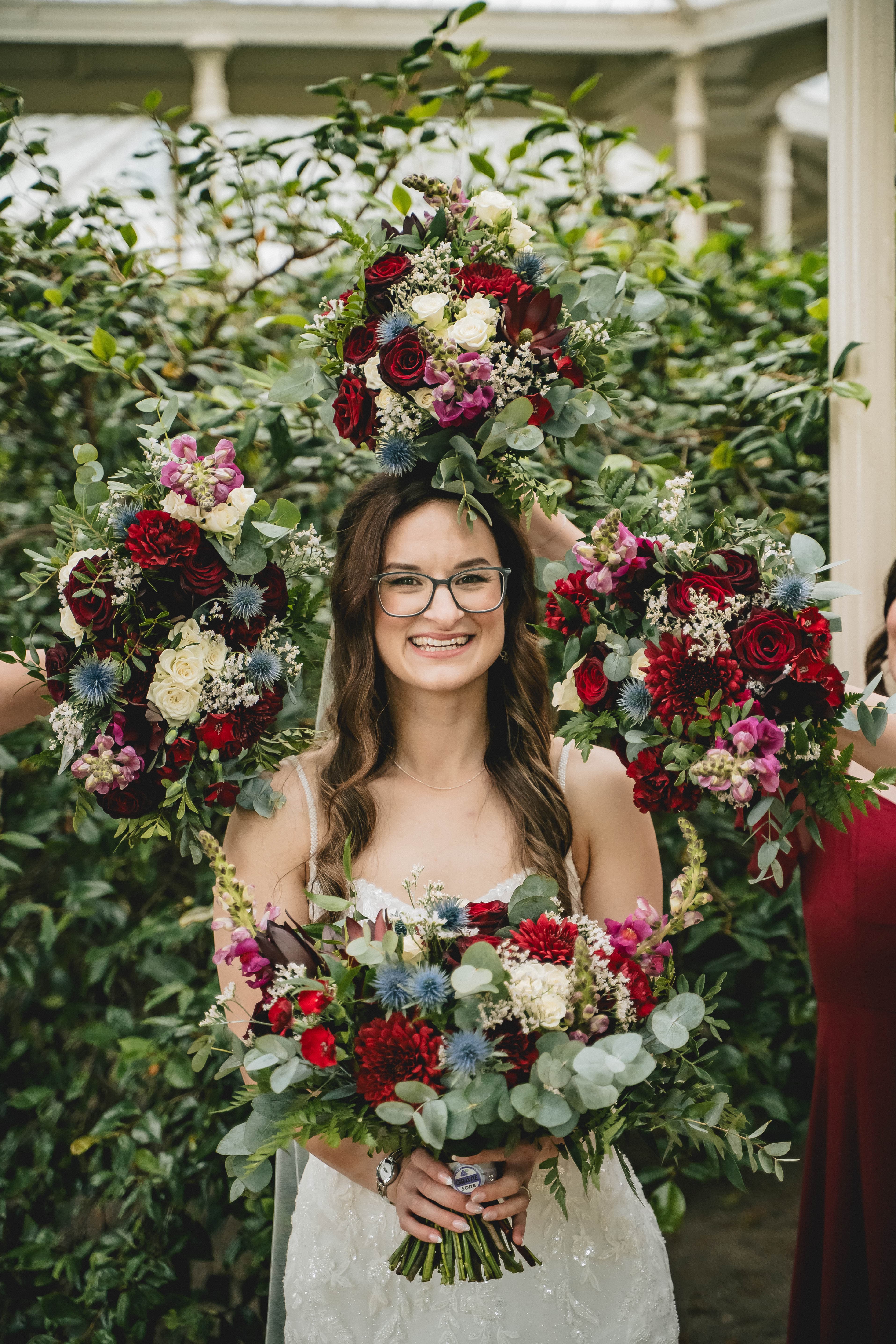 Couple sharing a quiet smile beneath festoon lights